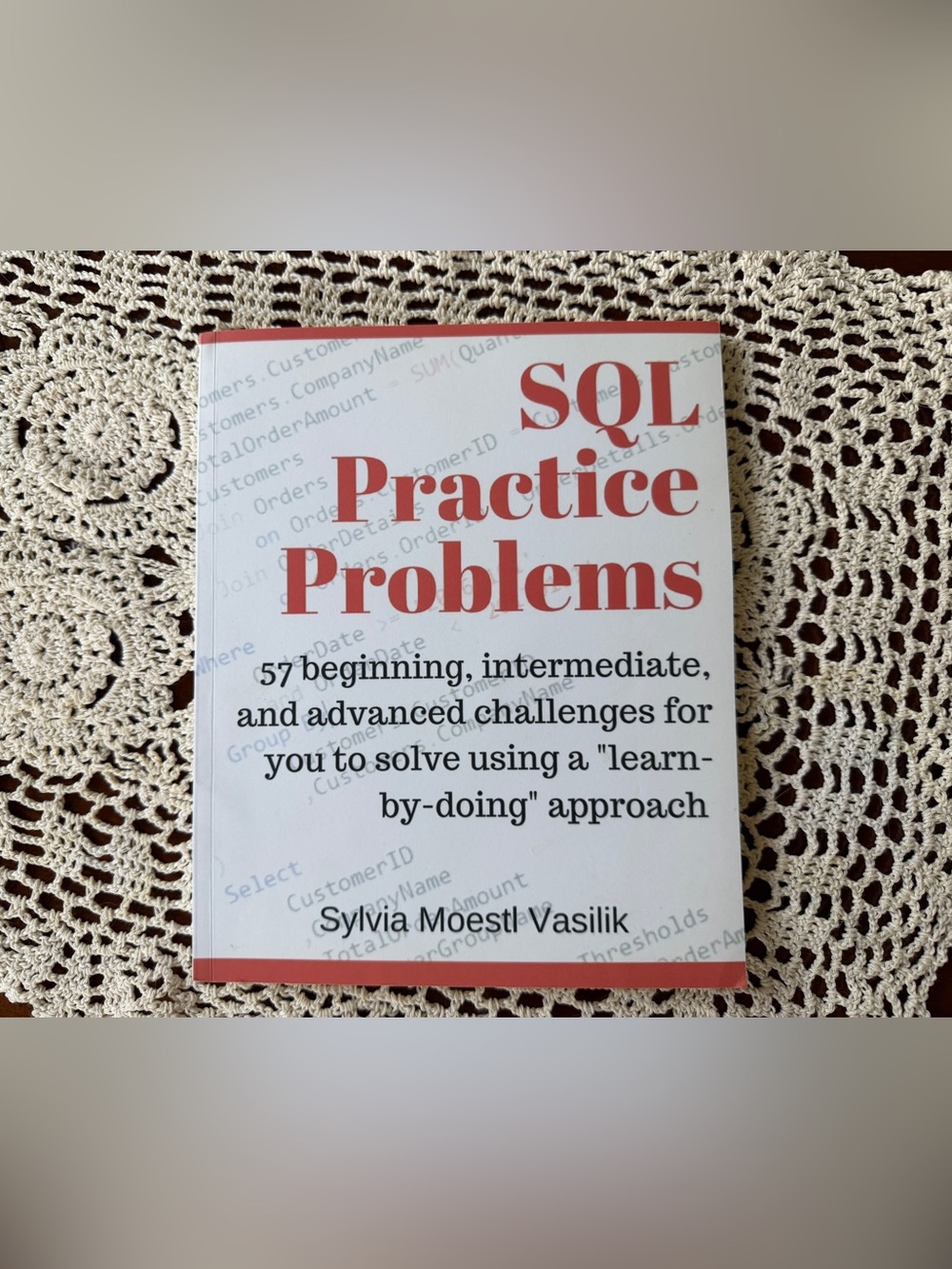 SQL Practice Problems by Sylvia Moestl Vasilik - White and Red Cover